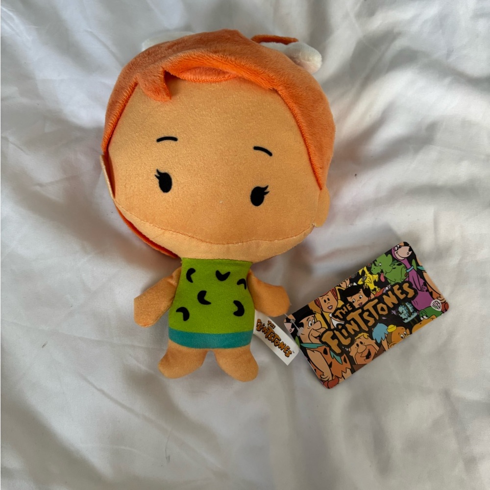 The Flintstones Pebbles Plush Toy with Orange Hair and Green Outfit